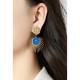 Oorclips | Wit zonnemotief in goudkleur | Elegante fashion oorclips