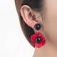 Rode oorclips met een bloemen hanger en een zwart oorstukje